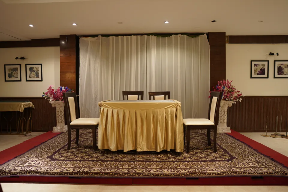 Gold-draped event stage